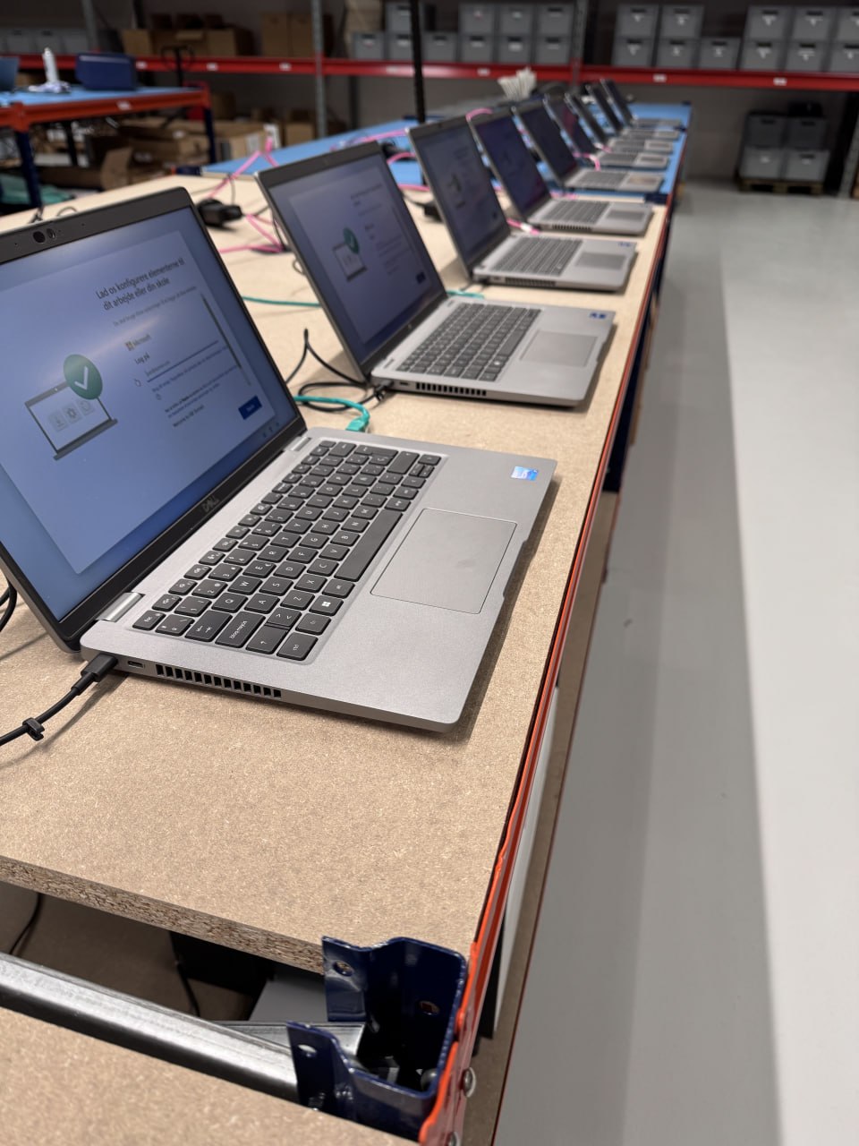 Rows of devices prepared for redeployment at Scandic IT